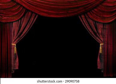 Classic red velvet stage curtain in a historic movie theater